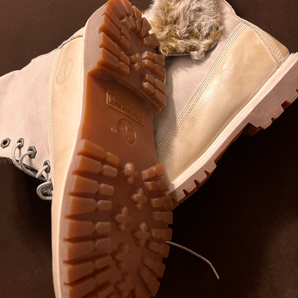 Special Edition leather, waterproof, roll-top boots with a faux-fur lining.